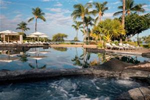 View of the pool and palm trees at Waikoloa Marriott